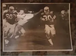  ?? MARK DALRYMPLE — CONTRIBUTE­D ?? Former Pleasant Valley running back Mark Dalrymple (30) runs the ball during the second Almond Bowl in 1972at Chico State’s University Stadium in Chico.