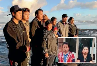  ??  ?? Family members gather at a blessing ceremony at Muriwai Beach yesterday. Inset: Kay Dah Ukay, left, and Mu Thu Pa Ukay.