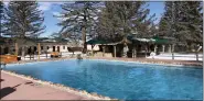  ?? MINDY SINK — SPECIAL TO THE DENVER POST ?? The big pool at Saratoga Hot Springs stays at 96to 98 degrees Fahrenheit year-round and is available for guest use.