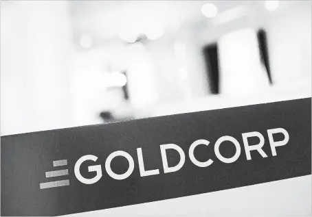  ?? AARON VINCENT ELKAIM THE CANADIAN PRESS ?? Newmont Mining Corp. will merge with rival Goldcorp Inc. accelerati­ng consolidat­ion in the global gold mining industry.
