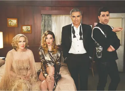  ?? CBC ?? Catherine O'hara, left, Annie Murphy, Eugene Levy and Daniel Levy star in Schitt's Creek, a comedy favoured to win several Emmys on Sunday.
