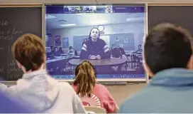  ?? NATIONAL CONSTITUTI­ON CENTER / JTWO FILMS ?? Grace Narkum, a student from Hubbard High School in Hubbard, Ohio, and her classmates participat­e in a National Constituti­on Center Peer-to-Peer Exchange with students from Radnor High School in Wayne, Pa., in March 2019.