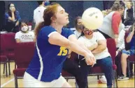  ?? Westside Eagle Observer/MIKE ECKELS ?? Lady Bulldog Bronwyn Berry uses a forearm pass to send the ball back over the net.