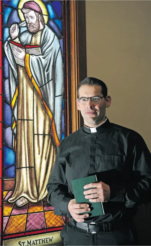 ?? LARRY WONG/ EDMONTON JOURNAL ?? Matthew Anthony Hysell, 35, was ordained Friday night in Edmonton and is the first deaf priest in Canada’s Catholic church.