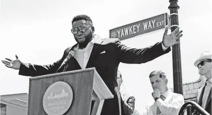  ?? CHARLES KRUPA/AP ?? In June 2017, Red Sox legend David Ortiz had a portion of Yawkey Way named after him.