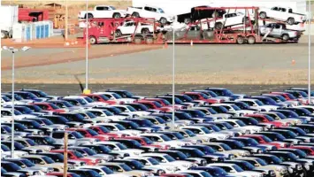  ?? — Reuters ?? Newly assembled vehicles are seen at a stockyard of the automobile plant Toyota Motor Manufactur­ing of Baja California in Tijuana, Mexico.