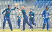  ?? PTI ?? ▪ Katherine Brunt (centre) celebrates Smriti Mandhana’s wicket.