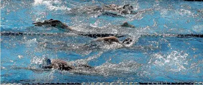  ?? WARWICK SMITH/STUFF ?? Swimmers do 50 laps of the 50-metre pool at The Lido.