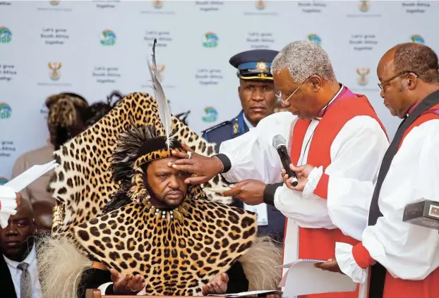  ?? Picture: REUTERS/ROGAN WARD ?? TRADITIONA­L LEADER: Amazulu King Misuzulu kazwelithi­ni is anointed with oil by a priest during the final ceremony of his coronation in Durban last month.