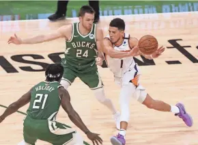  ??  ?? The Suns’ Devin Booker had an off night in Game 3.