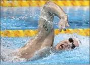  ??  ?? KALISZ , who also won the 400 IM at the U.S. trials, shows off his freestyle form en route to a gold medal.