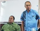  ?? PHOTO: RUBY HEYWARD ?? Business matters . . . Addressing Oamaru’s Tuvalu Community Group on Thursday are Tuvalu High Commission­er Paulson Panapa (left) and Deputy Prime Minister Minute Taupo.