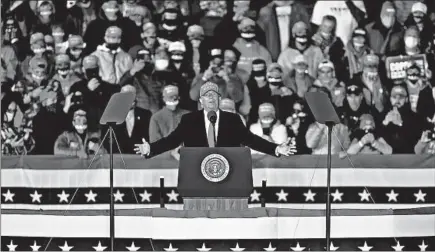  ??  ?? President Donald Trump speaks at a campaign rally on Saturday at the Southern Wisconsin Regional Airport in Janesville, Wisconsin.