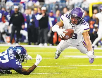  ?? BRUCE KLUCKHOHN AP ?? Vikings wide receiver Justin Jefferson (18) soars for a TD last time Minnesota met the Giants on Dec. 24.