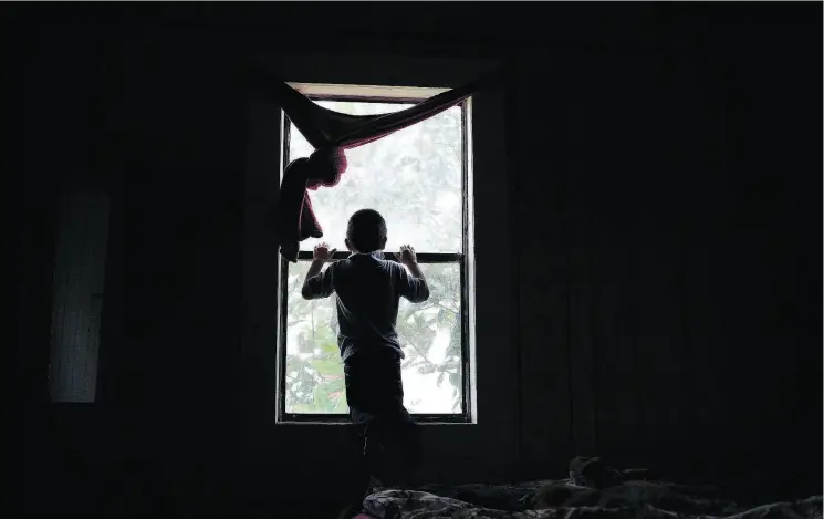  ?? PHOTOS: CHARLOTTE KESL / THE WASHINGTON POST ?? Five-year-old Adonias at his uncle’s home in Moultrie, Ga., where he and his father are living after being reunited last month.