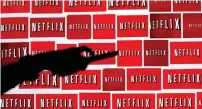  ?? — Reuters ?? Netflix to spend $8 billion on TV shows and movies in 2018.