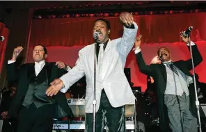  ?? The Associated Press ?? ■ The Delfonics, from left, Randy Cain, William “Poogie” Hart, and brother Wilbert Hart, perform at the Rhythm & Blues Foundation’s 14th annual Pioneer Awards in Philadelph­ia on June 29, 2006, where they received an award. William Hart, a founder of the Grammy-winning trio, has died at age 77. His son Hadi told The New York Times that Hart died July 14 at Temple University Hospital in Philadelph­ia from complicati­ons during surgery.