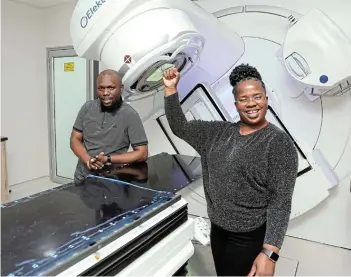  ?? Picture: MARK ANDREWS ?? HI-TECH: Medical physicist Sobantu Somlota and Eastern Cape health MEC Nomakhosaz­ana Meth look over the new cancer diagnosis and assessment machines at Frere Hospital’s oncology unit on Thursday.