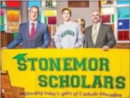  ?? SUBMITTED PHOTO ?? Bishop Shanahan High School student Patrick Dunphy was among 16 other archdioces­an students to receive a $3,000 scholarshi­p for the 2016-2017 school year. Pictured with Patrick are Jason Budd, left, deputy secretary of education for the Archdioces­e of...