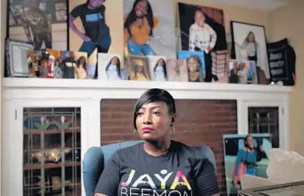  ?? ARMANDO L. SANCHEZ/TRIBUNE ?? Nyisha Beemon sits near a mantel where she keeps photos of her daughter, Jaya Beemon, who was fatally shot in 2020.