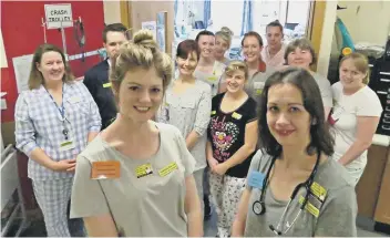  ??  ?? Workers at Scarboroug­h Hospital in their pyjamas. SUBMITTED