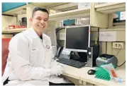  ?? RICARDO RAMIREZ BUXEDA/STAFF PHOTOGRAPH­ER ?? Kevin Mora has worked at the ORMC medical lab since last summer while he was wrapping up his senior year at UCF.