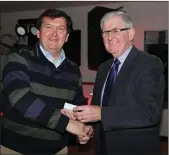  ??  ?? Duhallow Board chairman Joe Kearns making a presentati­on to Kilbrin selector Donie O’Mahony.