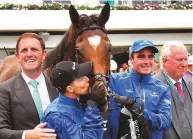  ?? AFP ?? Jockey Kerrin McEvoy kisses his horse in the mounting yard after winning the Melbourne Cup.