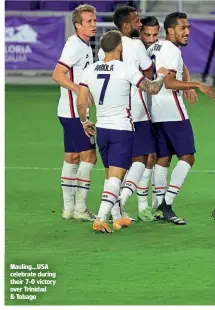  ??  ?? Mauling…USA celebrate during their 7-0 victory over Trinidad & Tobago