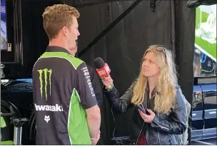  ?? ?? Grace Woelbing interviewi­ng Jake Garcia, who races in the NASCAR Craftsman Truck Series for Mcanally-hilgemann Racing, at the MHR race shop in Concord, N.C.