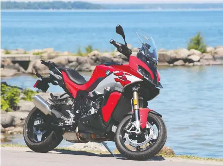  ?? PHOTOS: DAVID BOOTH/DRIVING ?? BMW redid the handlebar mounting to better isolate natural secondary vibrations on the 2020 BMW S1000XR.