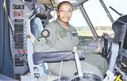  ?? Picture: Corporal Mabelina Mokoatle ?? FLYING HIGH. Major Nandi Zama, the first female to qualify as commander of the C-130 aircarft at 28 Squadron based at Air Force Base Waterkloof.