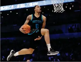  ?? ASSOCIATED PRESS ?? Charlotte Hornets Miles Bridges heads to the hoop during the NBA All-Star Slam Dunk contest Saturday in Charlotte, N.C.