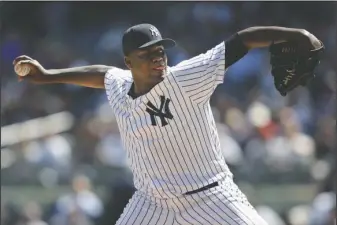  ??  ?? PITCHING PERFECTION: New York Yankees starting pitcher Michael Pineda throws during the second inning of the baseball game against the Tampa Bay Rays at Yankee Stadium Monday in New York. Pineda gave up two hits in 7 2/3 innings to claim the win.