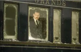  ?? NICOLA DOVE — TWENTIETH CENTURY FOX VIA AP ?? This image released by Twentieth Century Fox shows Johnny Depp in a scene from, “Murder on the Orient Express.”