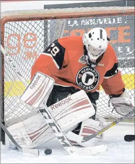  ?? PHOTO D’ARCHIVES, SIMON CLARK ?? √ L’entraîneur des gardiens de but des Remparts, Ghyslain Rousseau, aime bien la combativit­é, l’instinct et les qualités athlétique­s du gardien de 16 ans Callum Booth (photo).