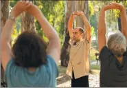  ?? JACK GUEZ / AGENCE FRANCE-PRESSE ?? Eliko Cohen gives a group lesson at Park Hayarkon in the Israeli city of Tel Aviv in June.