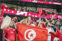  ?? ?? Tunisia’s supporters cheer before the start of the World Cup group D soccer match between Tunisia and France at the Education City Stadium in Al Rayyan, Qatar. (AP)