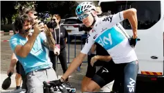  ??  ?? Chris Froome sits on his bicycle ahead of a training session for the Giro d’Italia, in Jerusalem. — Reuters photo