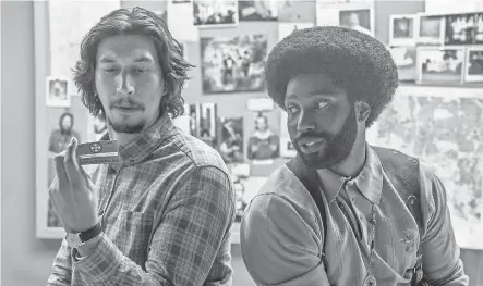  ??  ?? Flip Zimmerman (Adam Driver) and Ron Stallworth (John David Washington) infiltrate the Ku Klux Klan. FOCUS FEATURES