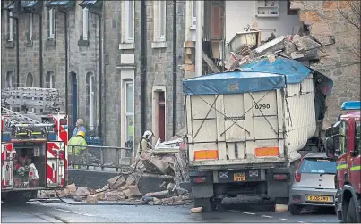  ??  ?? DEATH CRASH: The lorry crashed into the side of the house in 2013 and a Fatal Accident Inquiry will now be held. Picture: Colin Templeton