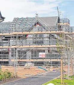  ?? Picture: Steven Brown. ?? The housing developmen­t is now well in progress at Dundee West but requires the upgrading of the Swallow roundabout on the A90 near Invergowri­e.