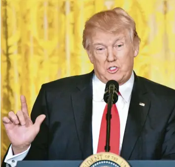  ?? Foto: Nicholas Kamm, afp ?? „Diese Regierung läuft wie eine gut abgestimmt­e Maschine.“Die Selbstwahr­nehmung des Donald Trump bei der Pressekonf­erenz im Weißen Haus klingt wie von einem anderen Stern.