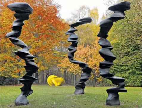  ??  ?? Tony Cragg’s three bronze figures, entitled Points of
View (2007), above; the metal spires of
Minster (1990), right Cragg’s materials have a life of their own in Secretions (1998), below