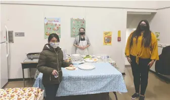  ??  ?? Breakfast is served at Hjorth Road Elementary with Manjot Badesha, right, a family outreach worker at the innercity school in North Surrey. Some children may not eat between lunch and breakfast the next day, she says.