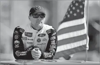  ?? RICK SCUTERI/AP PHOTO ?? NASCAR Monster Cup driver Kevin Harvick looks on before a race on March 11 at Avondale, Ariz.