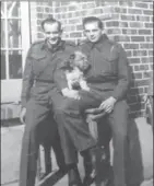  ??  ?? Frank and Harry Gibbons were twins and soldiers with the RHLI in Dieppe. Harry died. Frank was wounded. Here before the Dieppe landing, Frank is on the left and Harry on the right holding a dog.