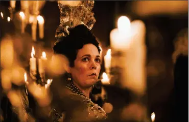  ?? Stanley Yankowskia/Fox Searchligh­t Pictures ?? Olivia Colman, in a breakout role, plays Queen Anne, a lonely, needy ruler who is half-mad, in “The Favourite.”