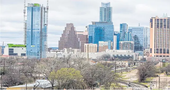  ?? THE NEW YORK TIMES ?? A view of downtown Austin, Texas from East Sixth Street.