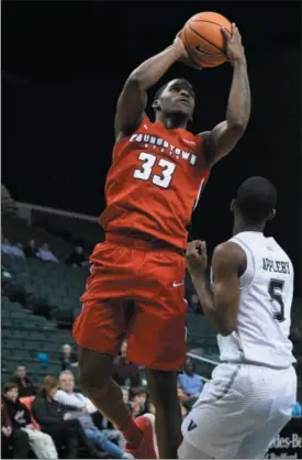  ?? ERIC BONZAR — THE MORNING JOURNAL FILE ?? Youngstown State forward Naz Bohannon shoots a jumper over Cleveland State’s Tyree Appleby last season. The Lorain grad will return to the Wolstein Center on Nov. 10 as the Penguins take on Akron in the first game of the Northeast Ohio Coaches vs. Cancer doublehead­er.